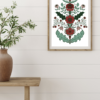 Julig poster med en kurbits i grönröda toner