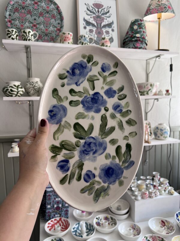 Ovalt fat blå rosor